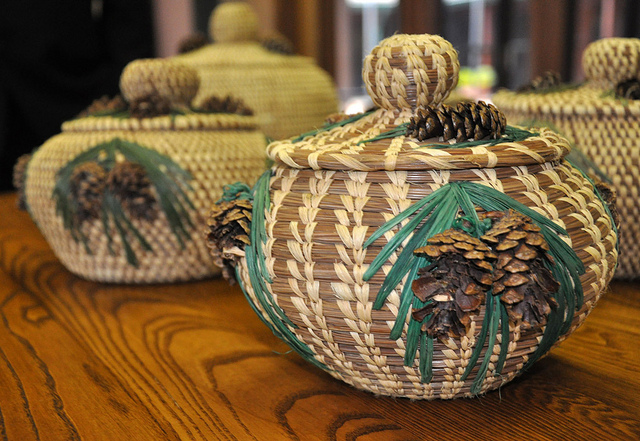 Photograph from the summer of 2011 in Texas. Alabama-Coushatta Tribe of Texas creating longleaf pine needle baskets. (Photographer: Beverly Moseley, Public Affairs Specialist, USDA-NRCS. Coutrtesy of NRCS and the National Agroforestry Center www.unl.edu/nac/).